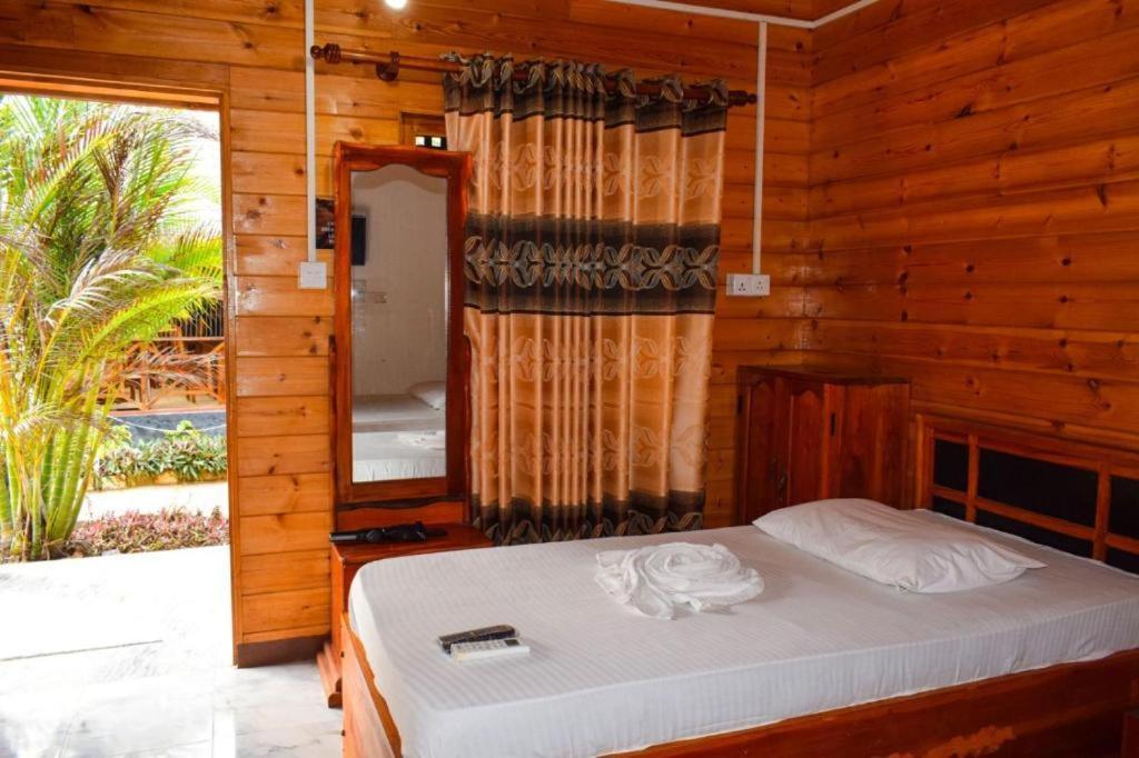 Mithra Paradise Beach Hotel Nilaveli Exterior photo